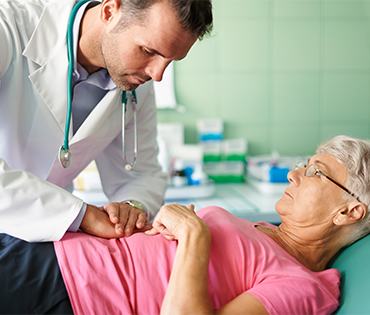Doctor Performing Pancreatic Cancer Treatment